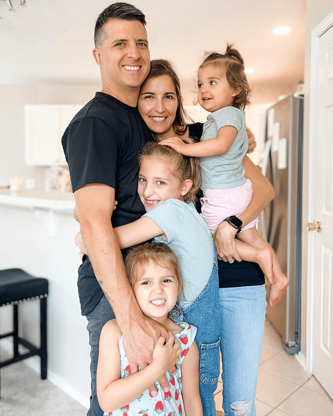 Episode 88 photo of the Lopes family hugging.