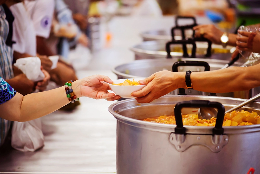 Serving food to kids.